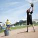 A Lincoln softball player attempts to field a ball at second base during practice on Tuesday, May 7. Daniel Brenner I AnnArbor.com